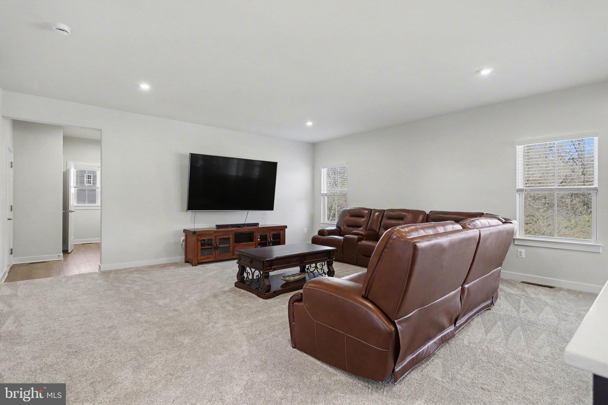 220 Kortney Drive Hanover, PA 17331 - Photo 7 of 41 a living room with furniture and a flat screen tv