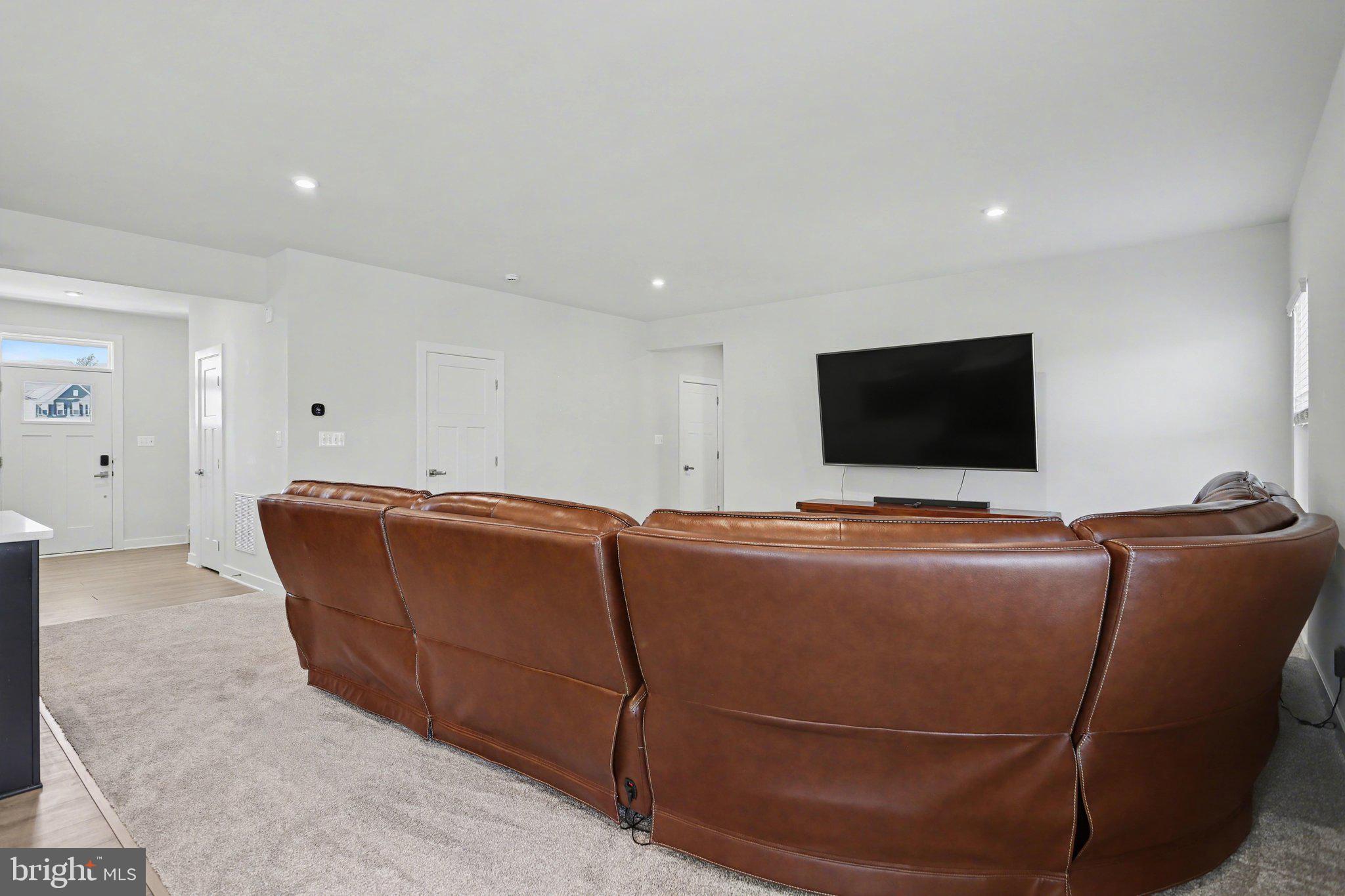 220 Kortney Drive Hanover, PA 17331 - Photo 9 of 41 a living room with furniture and a flat screen tv