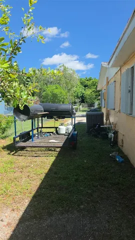 a view of a swimming pool with a garden