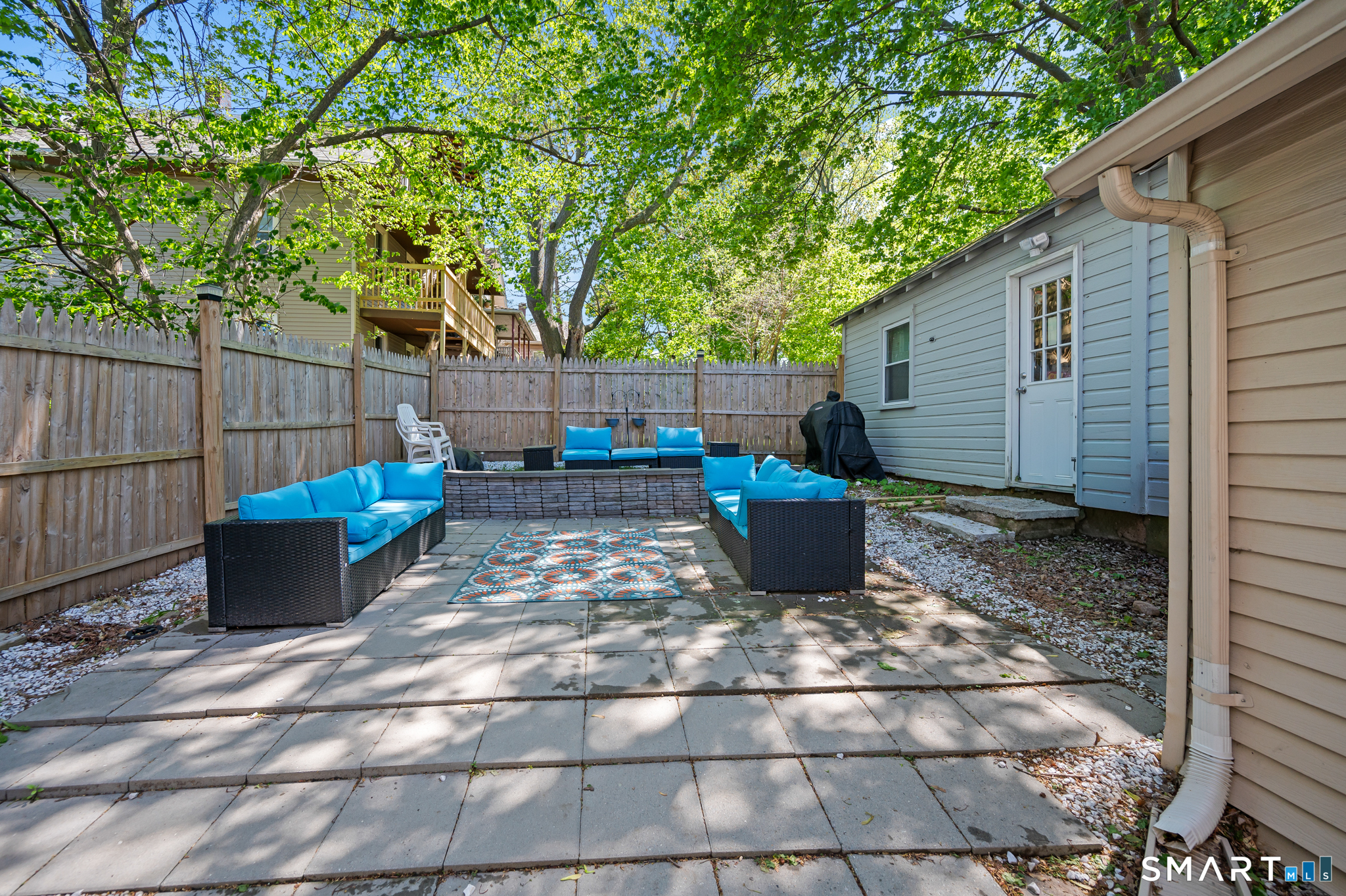 3 Flower Street Middletown, CT 06457 - Photo 16 of 17 a view of a backyard with sitting area