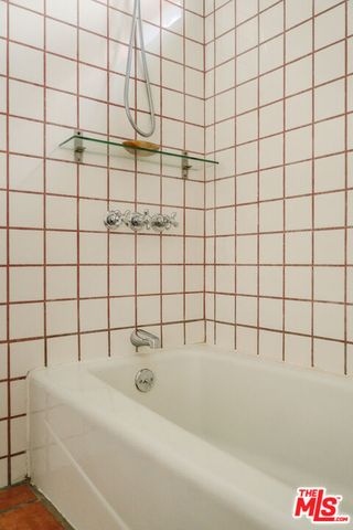 a view of backyard with sitting area