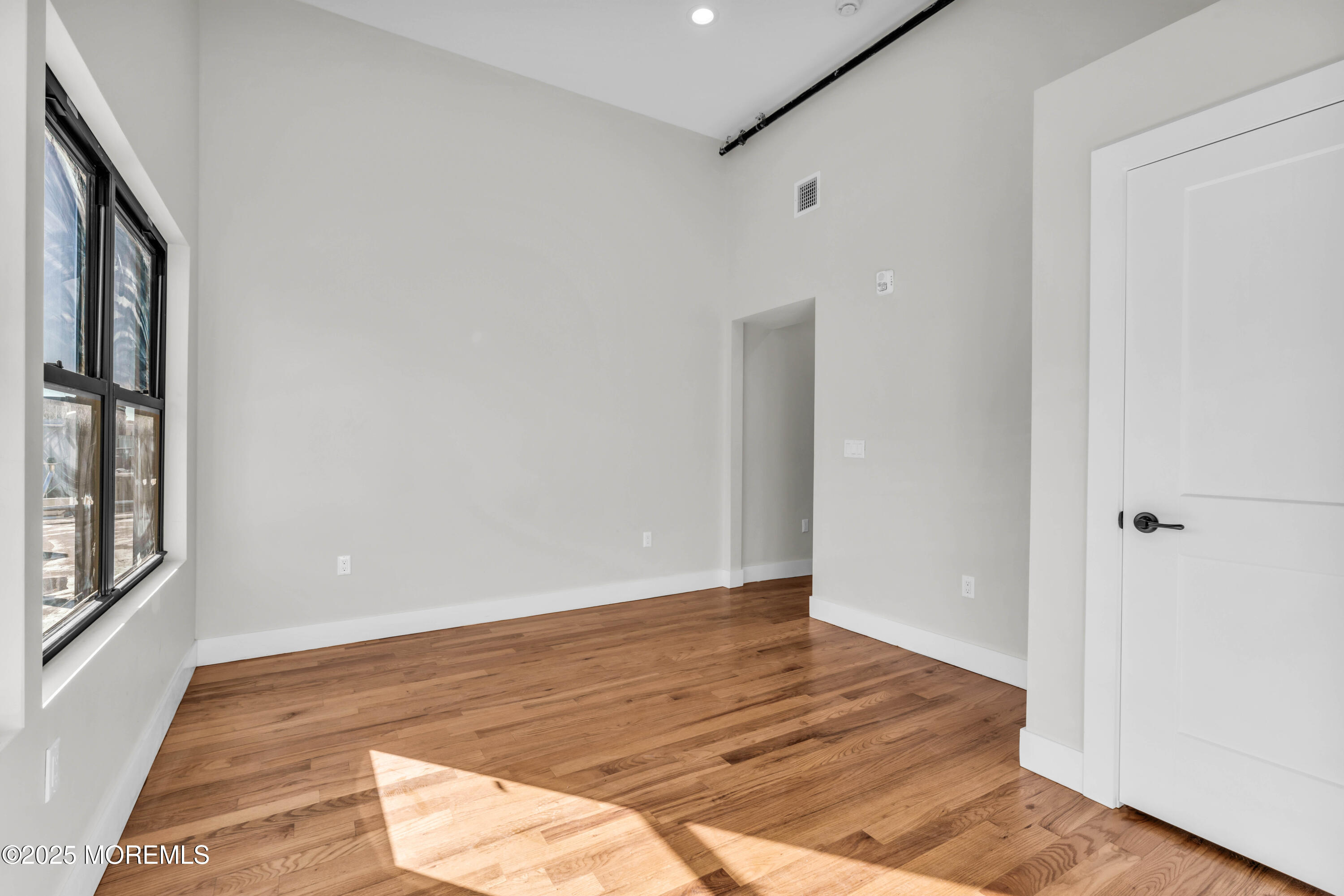 7 Broad Street, Unit 3 Red Bank, NJ 07701 - Photo 3 of 18 a view of an empty room