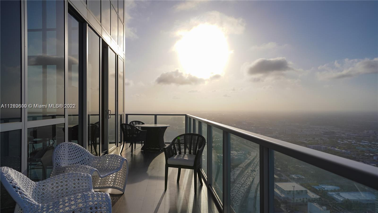 1100 Biscayne Boulevard, Unit 6307 Miami, FL 33132 - Photo 17 of 19 a view of balcony with furniture