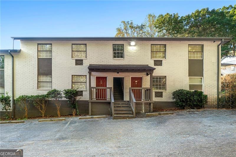 156 Fairfield Place Northwest Atlanta, GA 30314 - Photo 15 of 17 a front view of a house with a yard