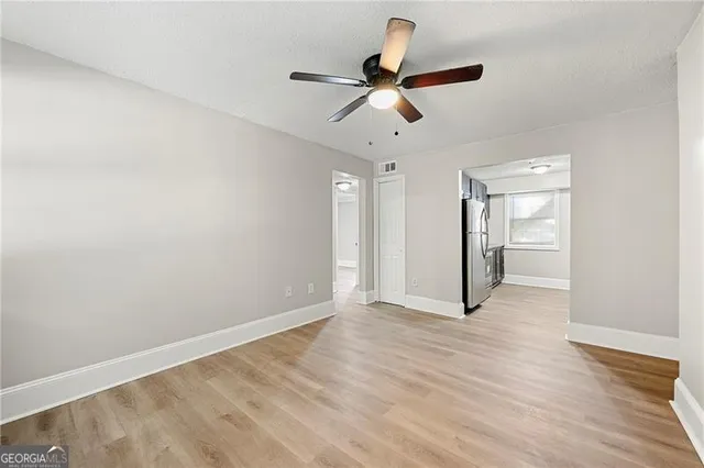 a view of an empty room and window