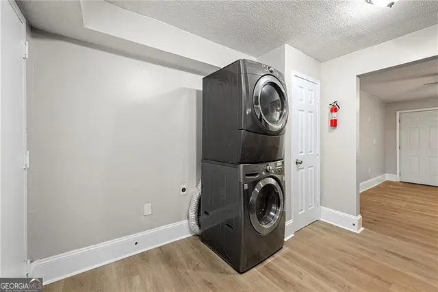 a view of storage and utility room with washer and dryer