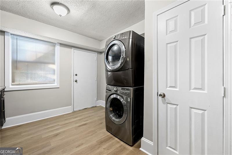 156 Fairfield Place Northwest Atlanta, GA 30314 - Photo 9 of 17 a utility room with dryer and washer