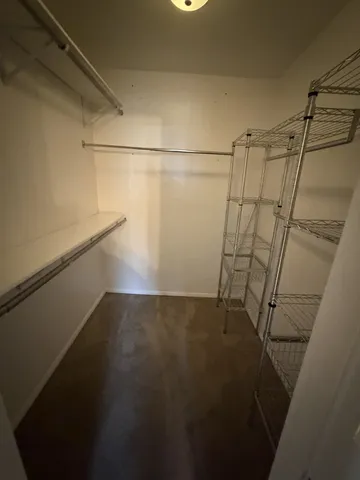 a view of a room with racks on the wall