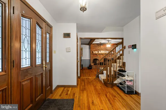 a view of a entryway with wooden floor
