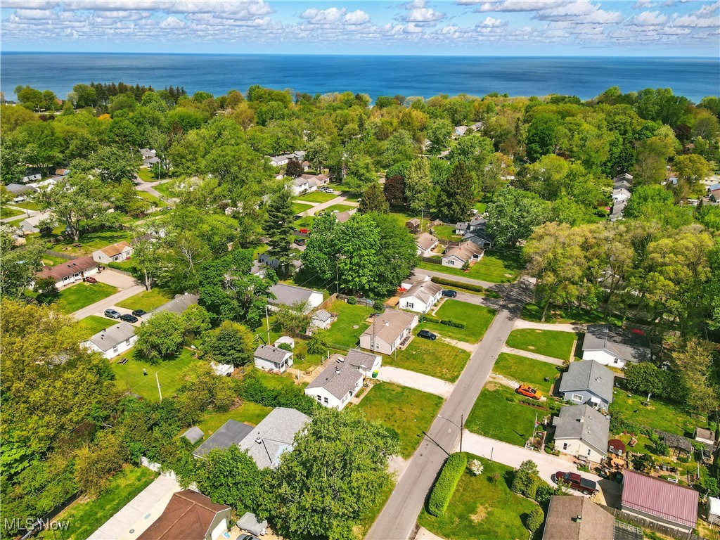 1942 Benjamin Road Madison, OH 44057 - Photo 28 of 29 Aerial view of property's location featuring nearby suburban area and a large body of water