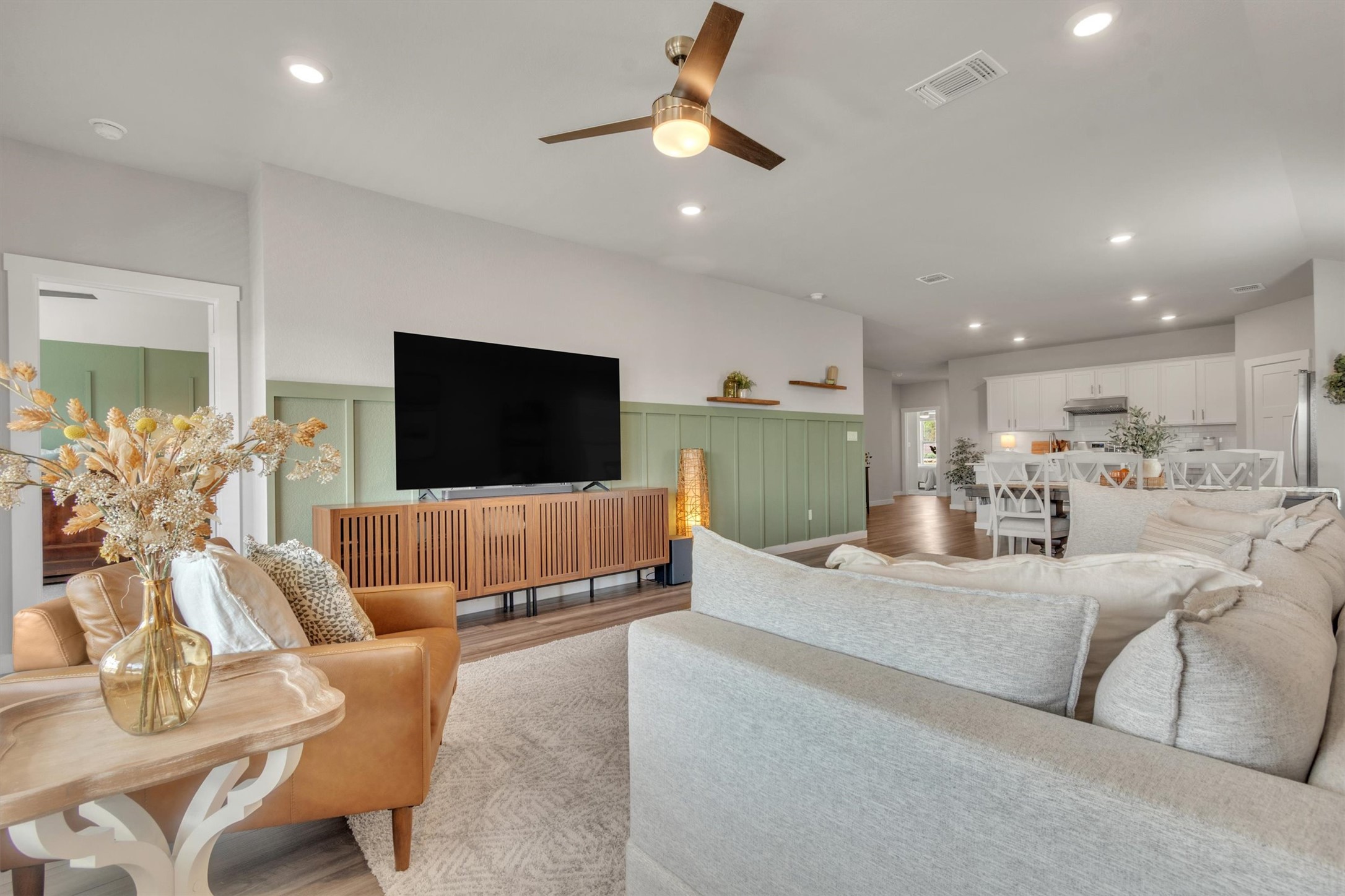 1008 Tipton Street Georgetown, TX 78633 - Photo 11 of 39 a living room with furniture and a flat screen tv