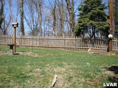 945 Birch Road Hellertown, PA 18055 - Photo 6 of 24 Tree lined and fenced in backyard. NO home is behind.