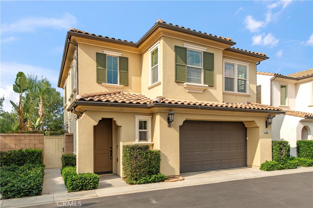 166 Desert Bloom Irvine, CA 92618 - Photo 2 of 36 front view of a house