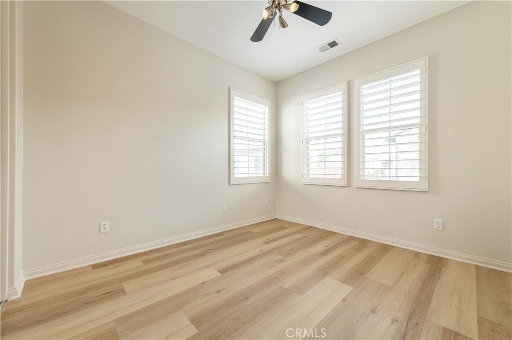 166 Desert Bloom Irvine, CA 92618 - Photo 27 of 36 a view of an empty room with a window