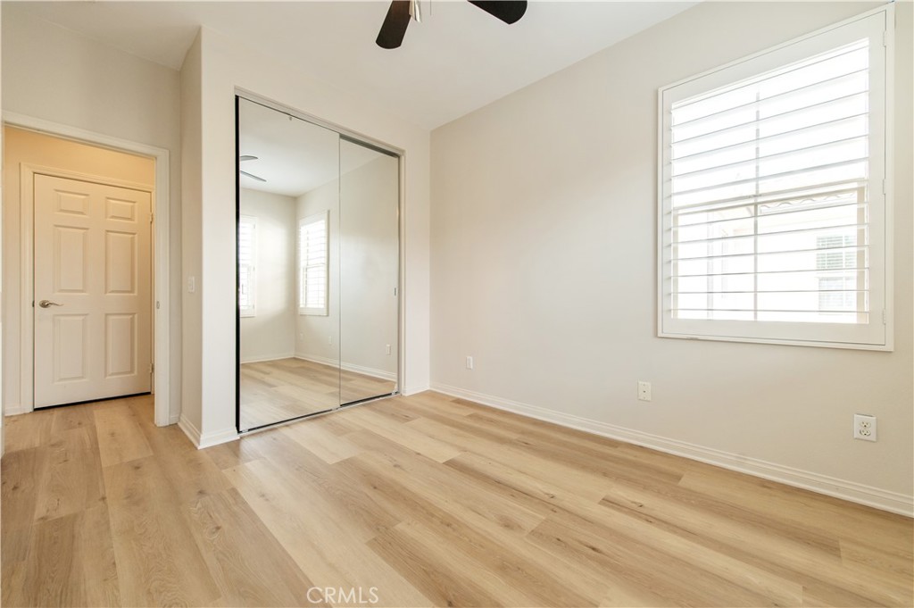 166 Desert Bloom Irvine, CA 92618 - Photo 28 of 36 wooden floor in an empty room