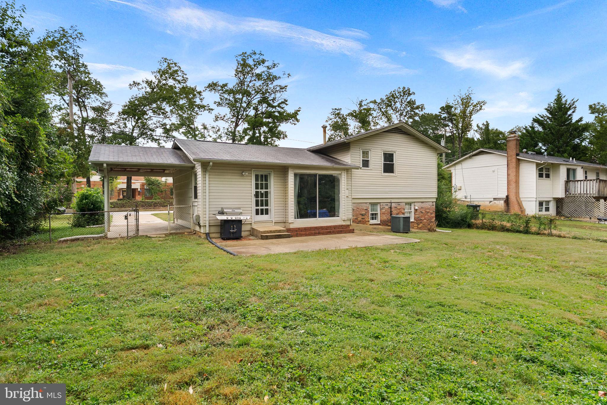 6313 Bardu Avenue Springfield, VA 22152 - Photo 26 of 26 a view of a house with backyard porch and sitting area