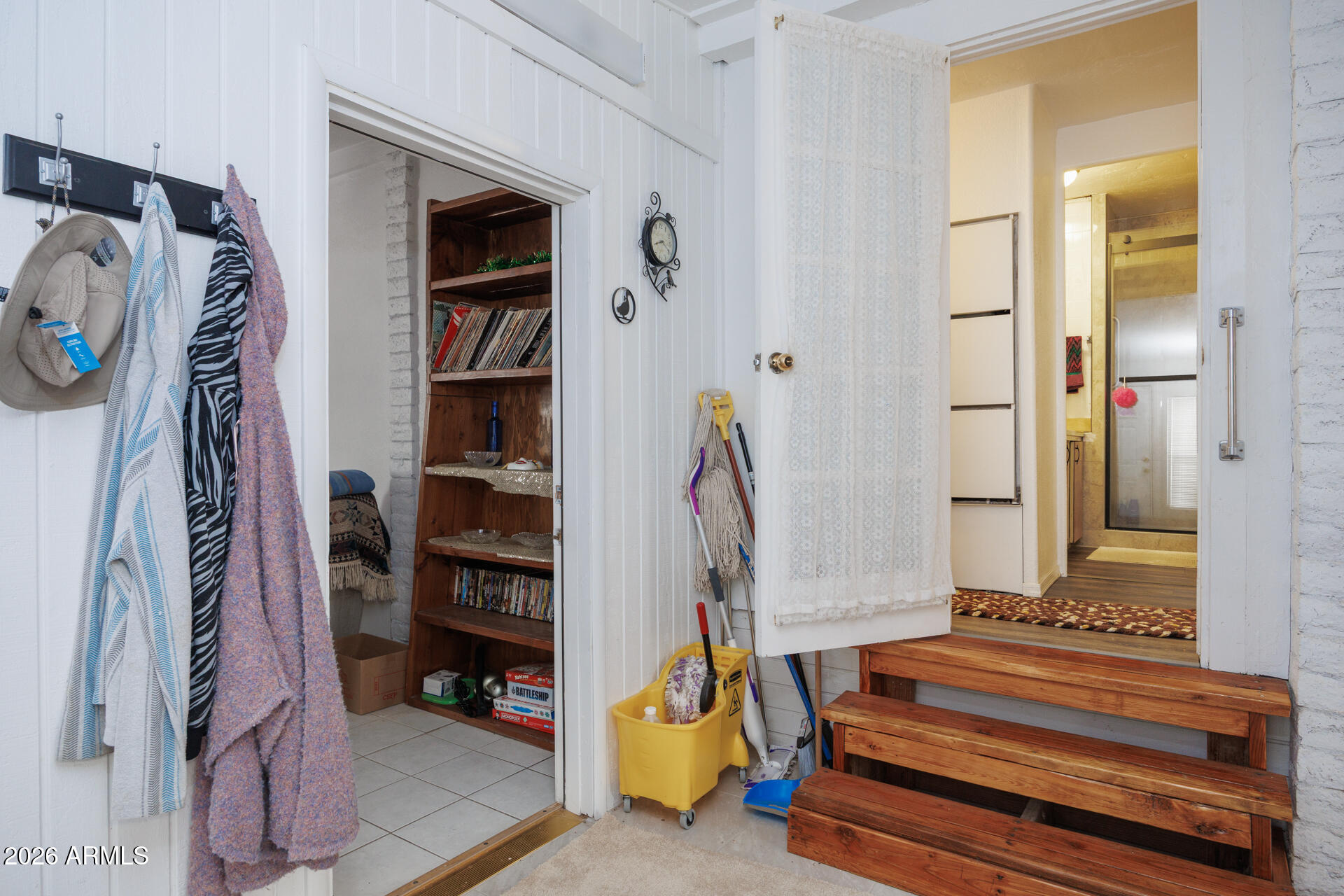 6185 East Monitor Street Picacho, AZ 85141 - Photo 30 of 55 a view of walk in closet with clothes and shoes