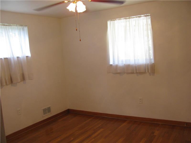 3408 Rigel Street Brighton Heights, PA 15212 - Photo 10 of 14 Bedroom. 2nd bedroom with closet, ceiling fan, hardwood floors and