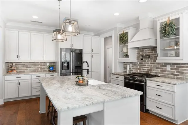 a view of a storage & utility room with closet window