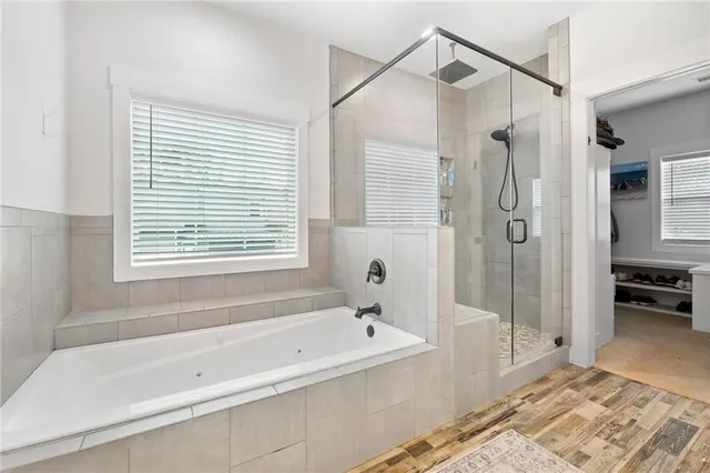 an aerial view of a house with swimming pool garden and patio