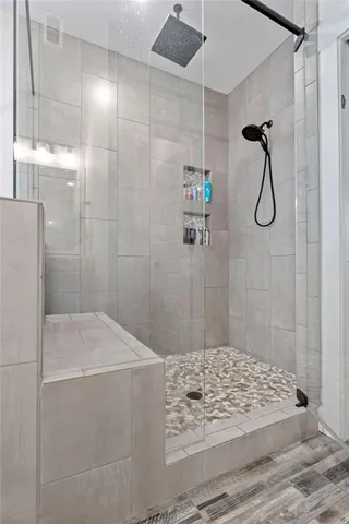 an aerial view of a house with outdoor space