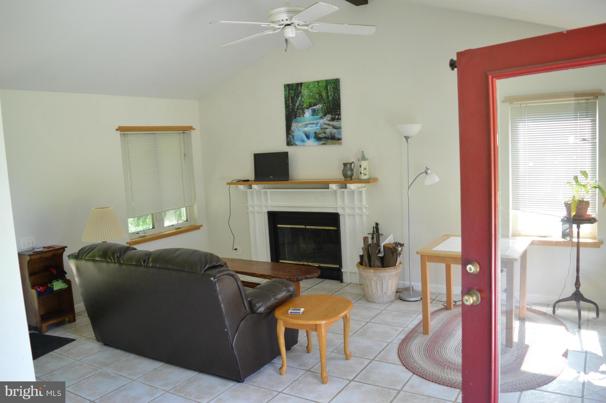 38313 North Fork Road Purcellville, VA 20132 - Photo 18 of 30 Guest House Great Room with Fireplace