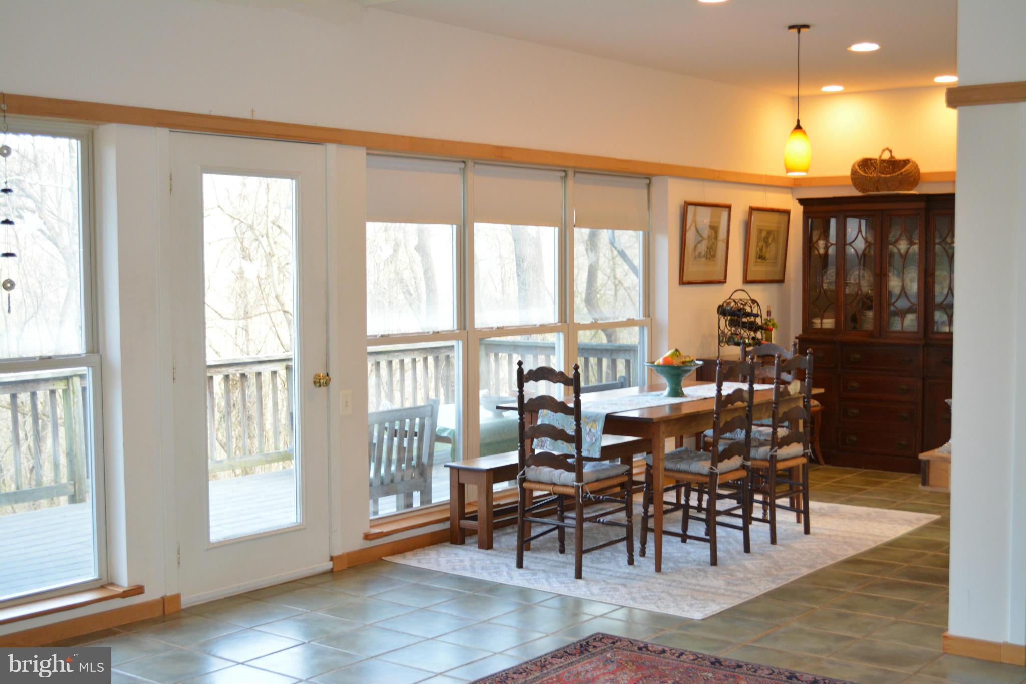 38313 North Fork Road Purcellville, VA 20132 - Photo 9 of 30 Dine al fresco by the huge windows any season