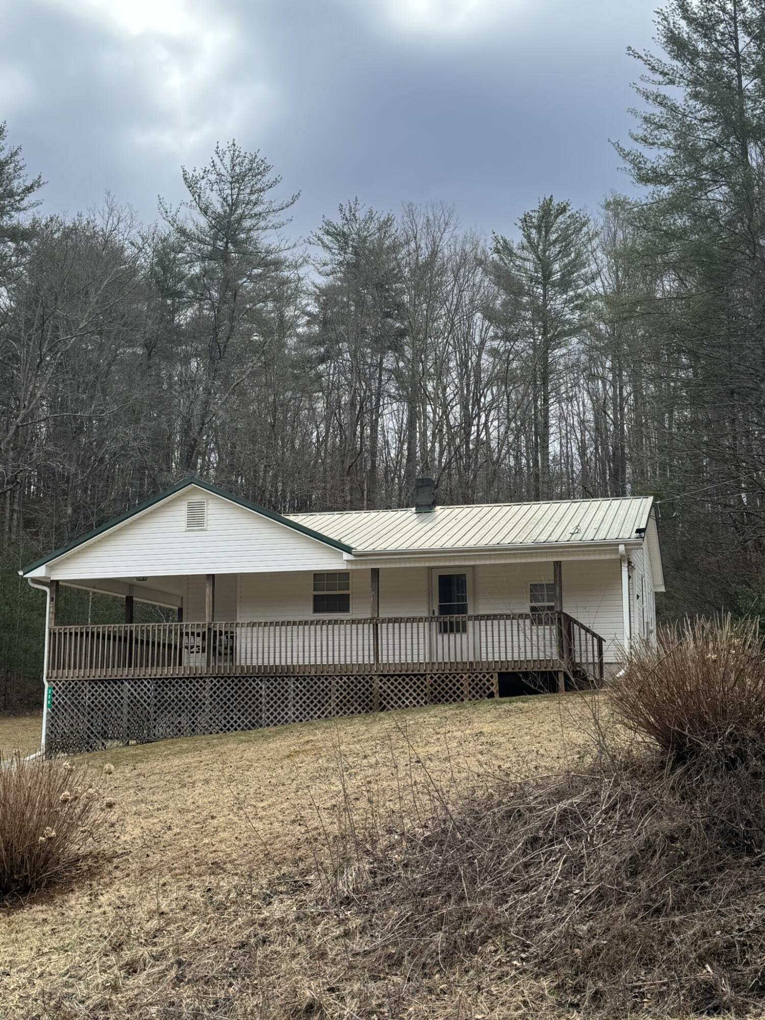 286 Ingramville Road Ferrum, VA 24088 - Photo 2 of 25 a front view of a house with a garden