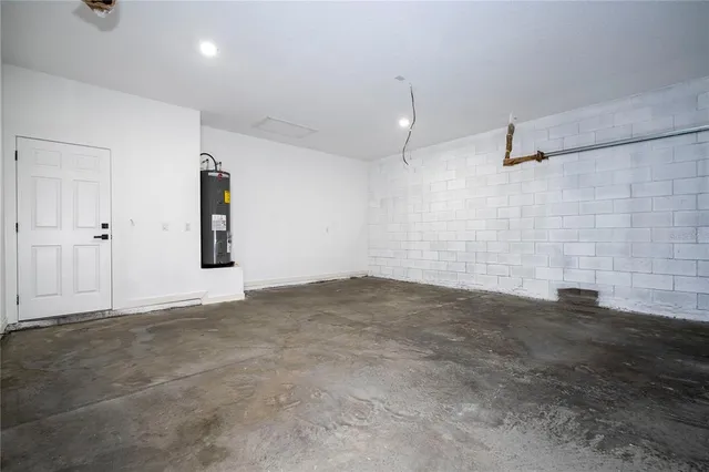 an empty room with a empty space and windows