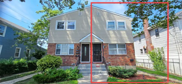 front view of house with a yard