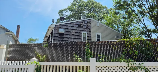 a view of a wooden fence