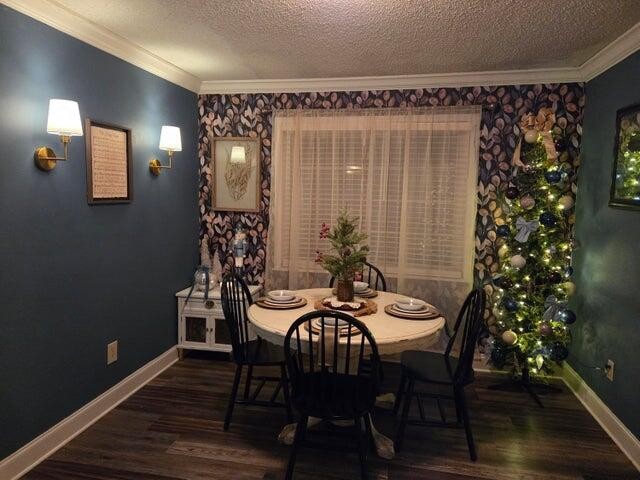 2596 Keith Valley Road Southeast Cleveland, TN 37323 - Photo 7 of 24 a view of a dining room with furniture and wooden floor