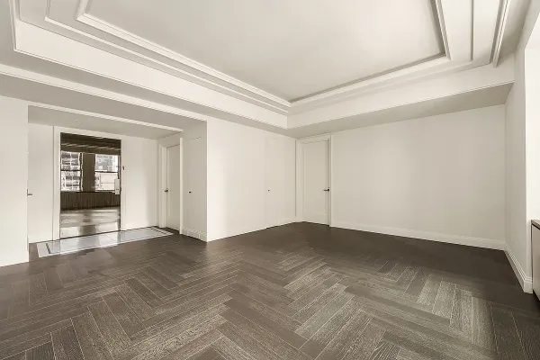 a black and white photo of a living room