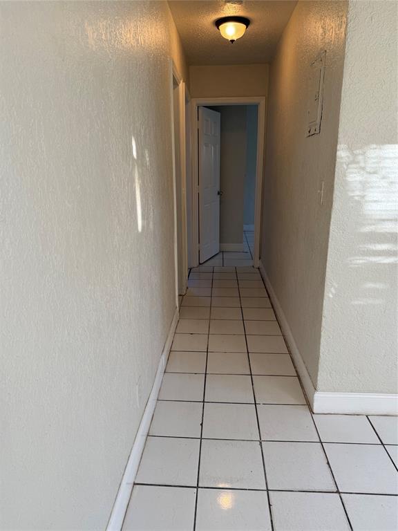 720 Southwest 7th Street, Unit 1 Dania Beach, FL 33004 - Photo 4 of 13 a view of a hallway
