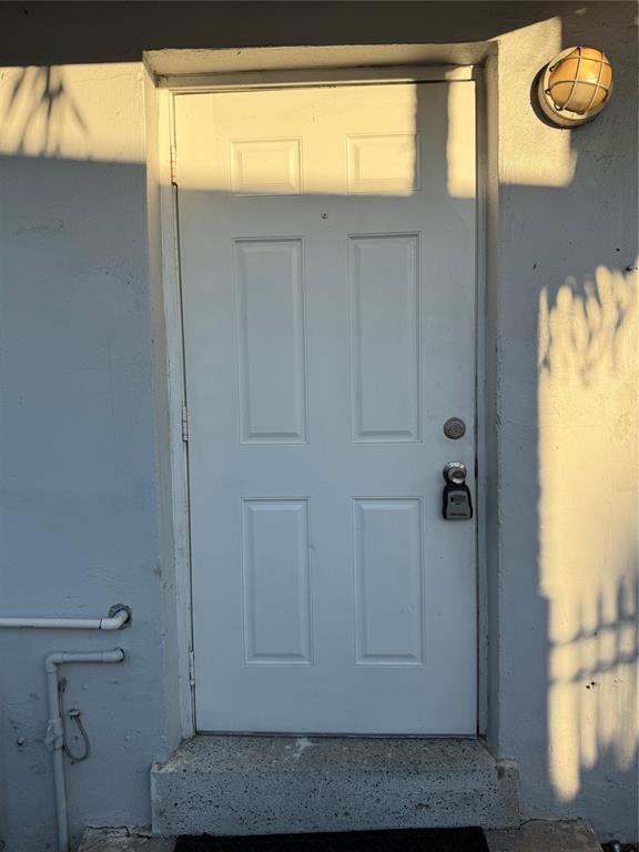 720 Southwest 7th Street, Unit 1 Dania Beach, FL 33004 - Photo 9 of 13 a view of front door