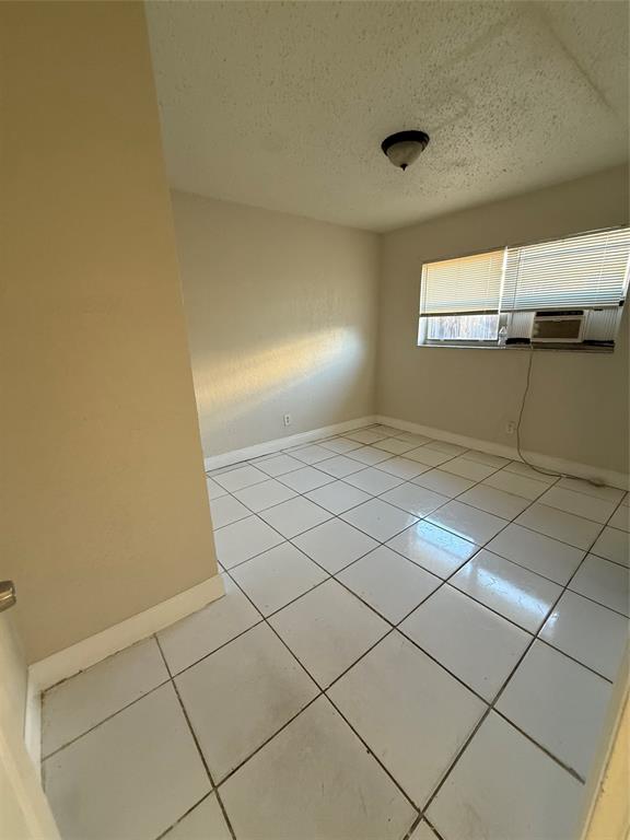 720 Southwest 7th Street, Unit 1 Dania Beach, FL 33004 - Photo 10 of 13 a view of an empty room