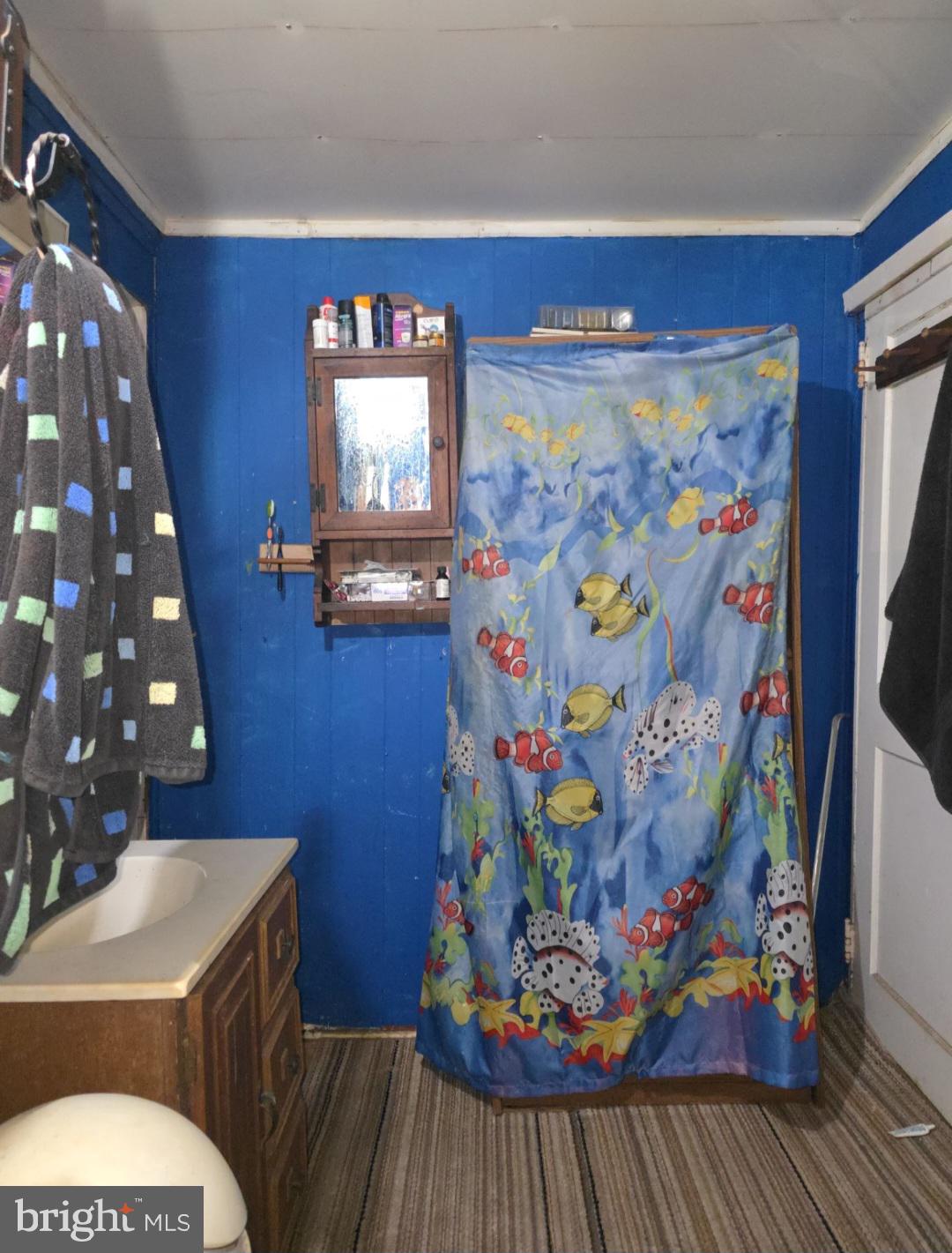 305 Main Street Newport, NJ 08345 - Photo 20 of 26 a view of a workspace with furniture and wooden floor