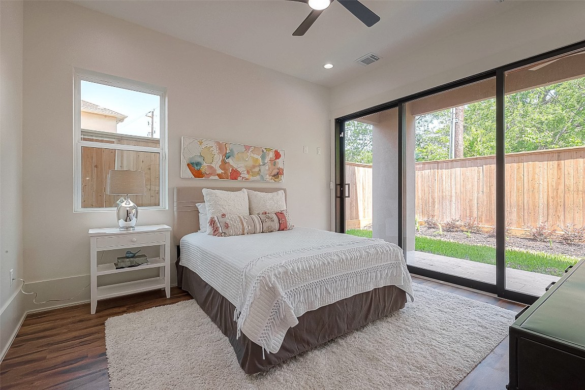 5510 Bosque Street Houston, TX 77056 - Photo 22 of 50 a bedroom with a large bed and a window