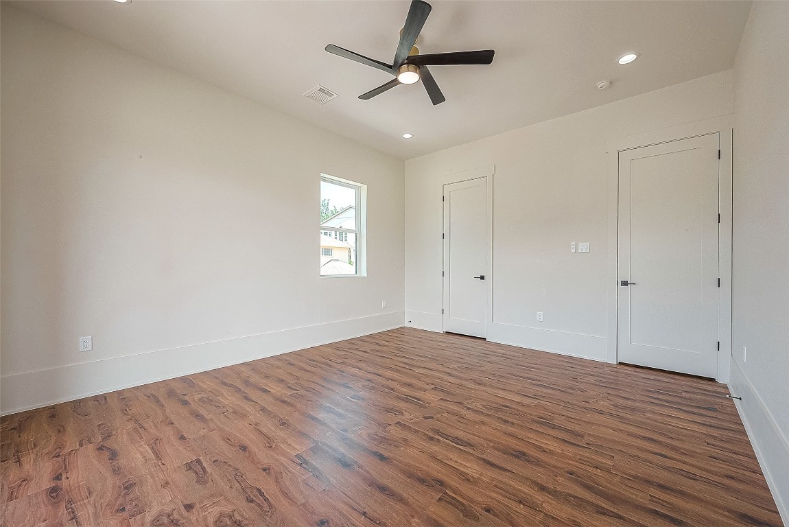 5510 Bosque Street Houston, TX 77056 - Photo 32 of 50 a view of empty room with wooden floor and fan
