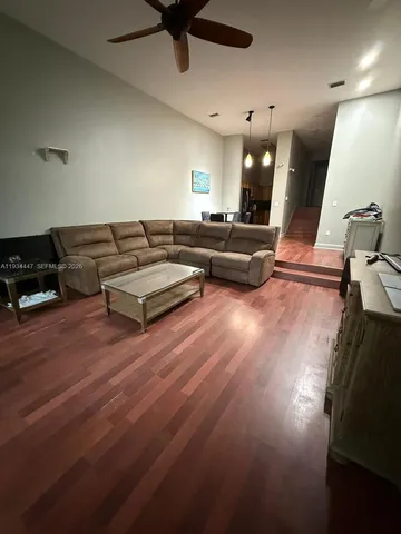 a kitchen with stainless steel appliances a refrigerator and a stove