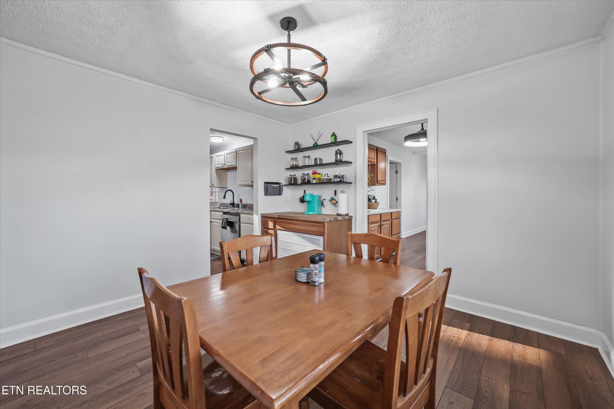 183 Laurel Road Clinton, TN 37716 - Photo 21 of 59 a view of a dining room with furniture and a chandelier