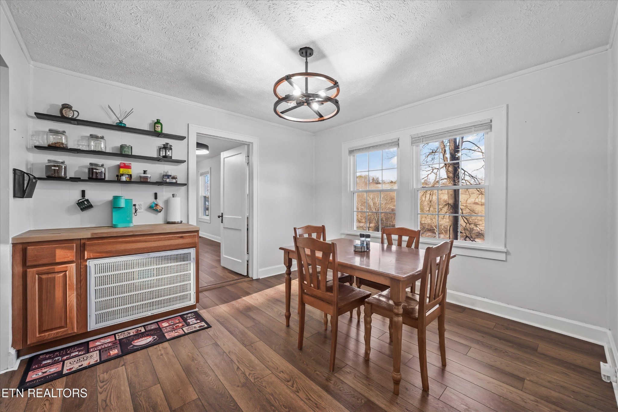 183 Laurel Road Clinton, TN 37716 - Photo 22 of 59 a view of a dining room with furniture window and wooden floor
