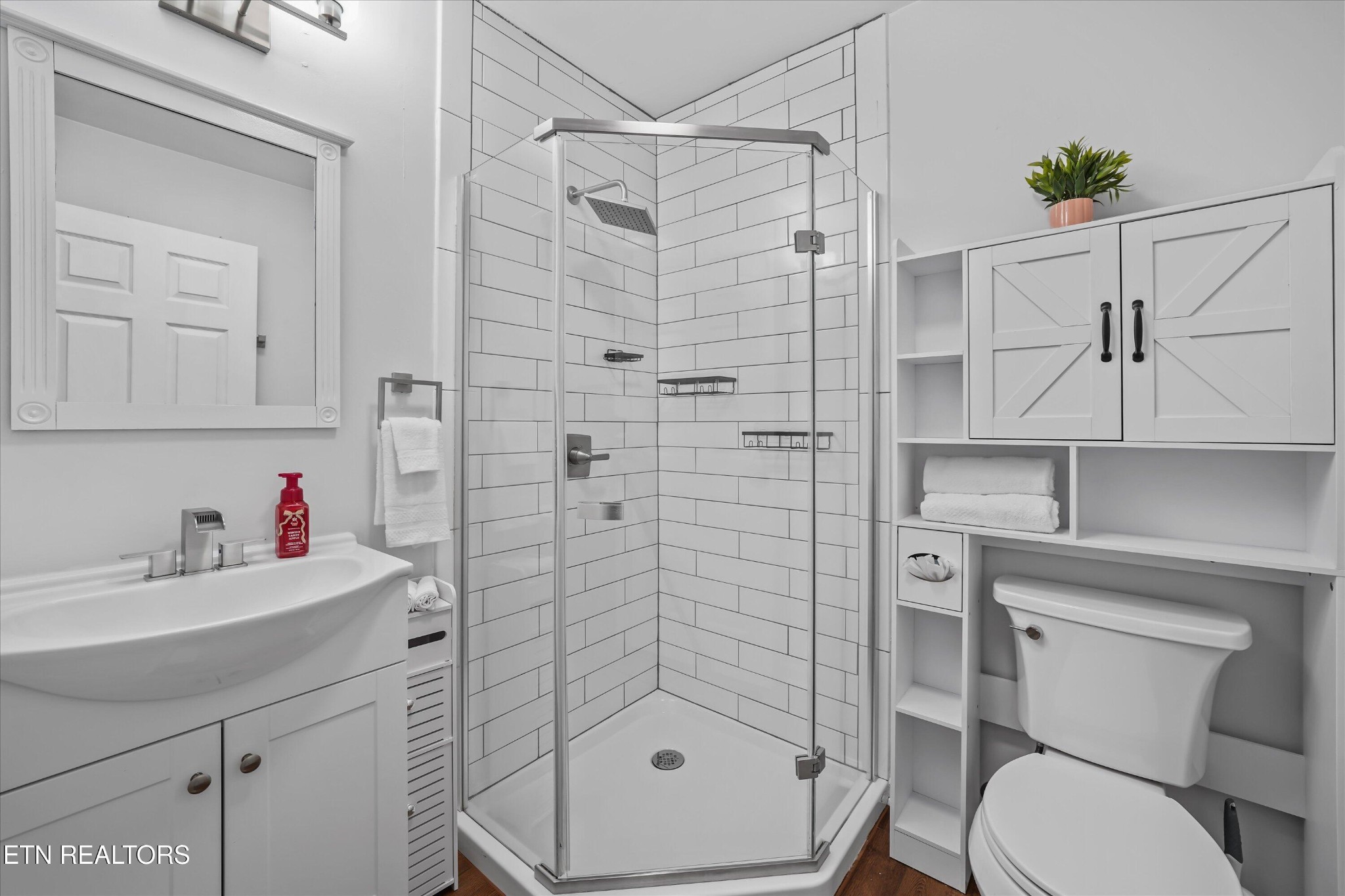 183 Laurel Road Clinton, TN 37716 - Photo 30 of 59 a bathroom with a sink toilet and shower