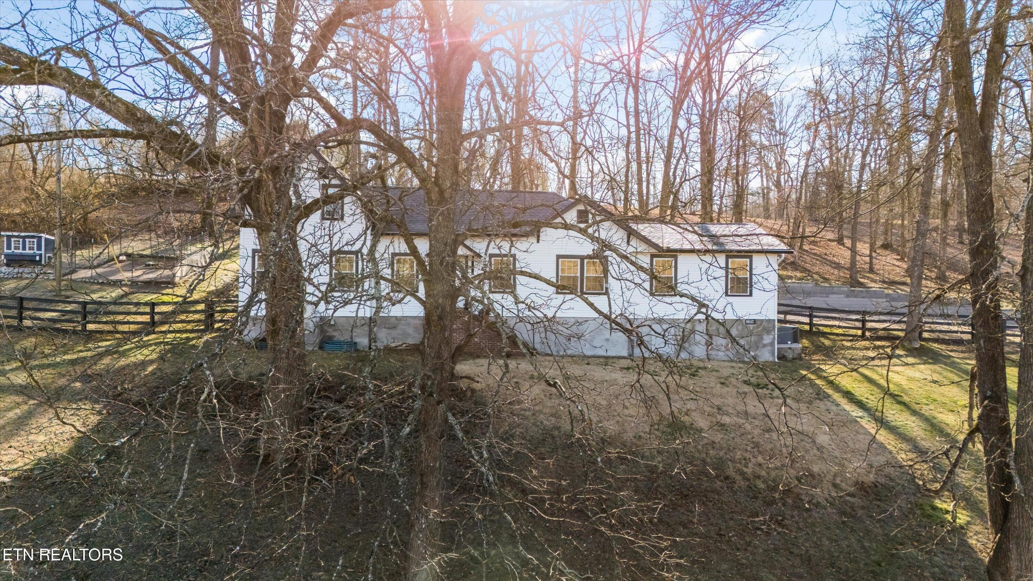 183 Laurel Road Clinton, TN 37716 - Photo 4 of 59 a backyard of a house with lots of green space