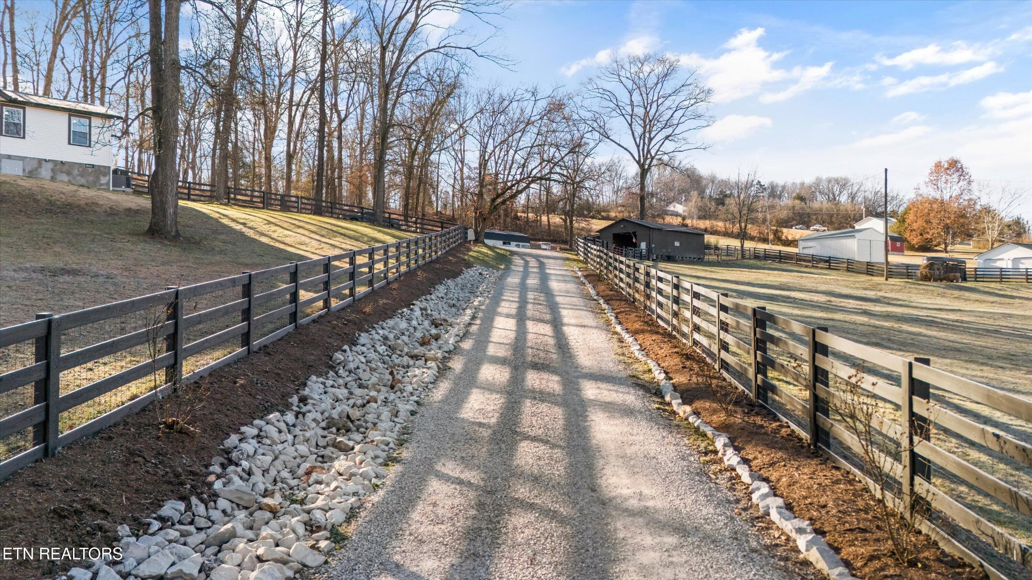 183 Laurel Road Clinton, TN 37716 - Photo 44 of 60 a view of a pathway with a wrought fence