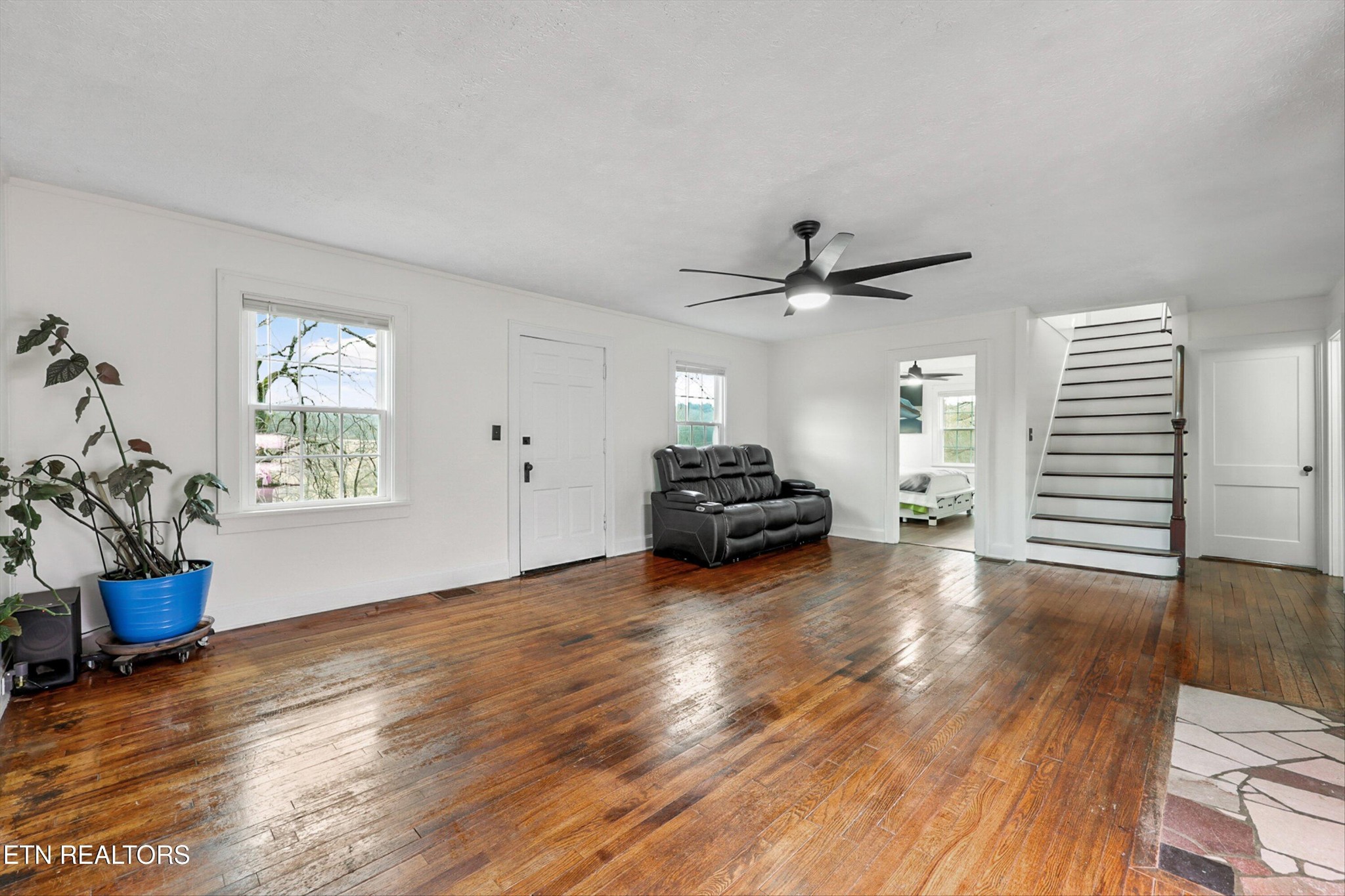 183 Laurel Road Clinton, TN 37716 - Photo 8 of 60 a living room with furniture and a wooden floor