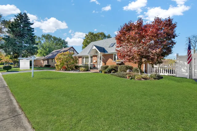 a view of a house with a big yard