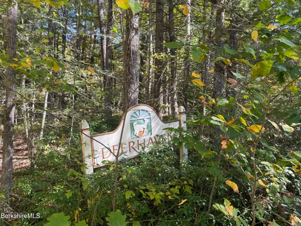 an aerial view of houses with yard