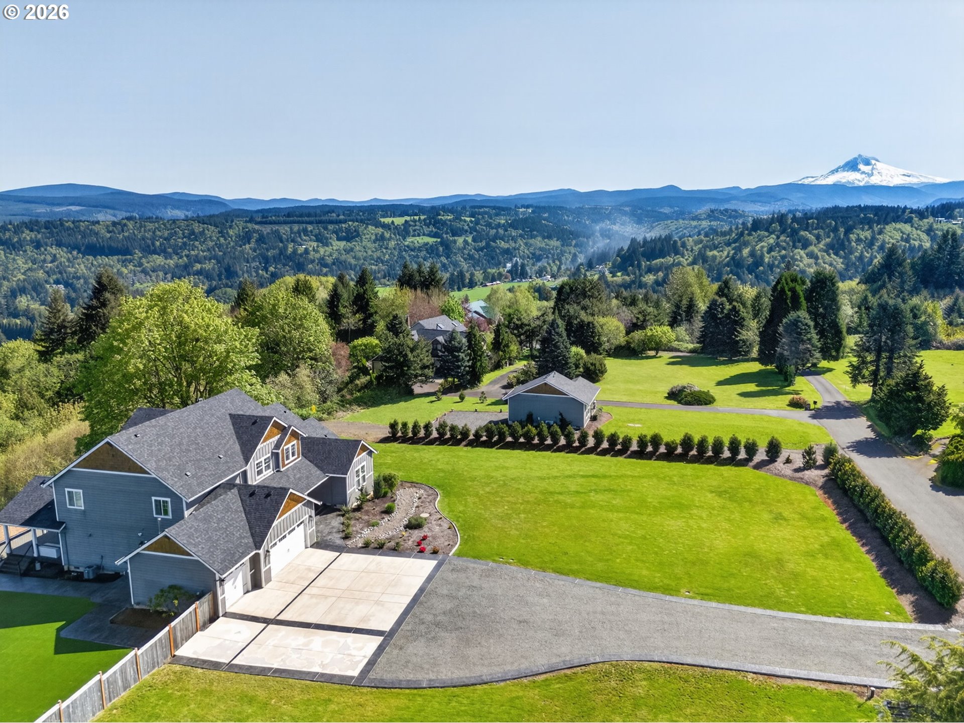 18255 Southeast Vista View Court Sandy, OR 97055 - Photo 1 of 48 an aerial view of a house with a yard and mountain
