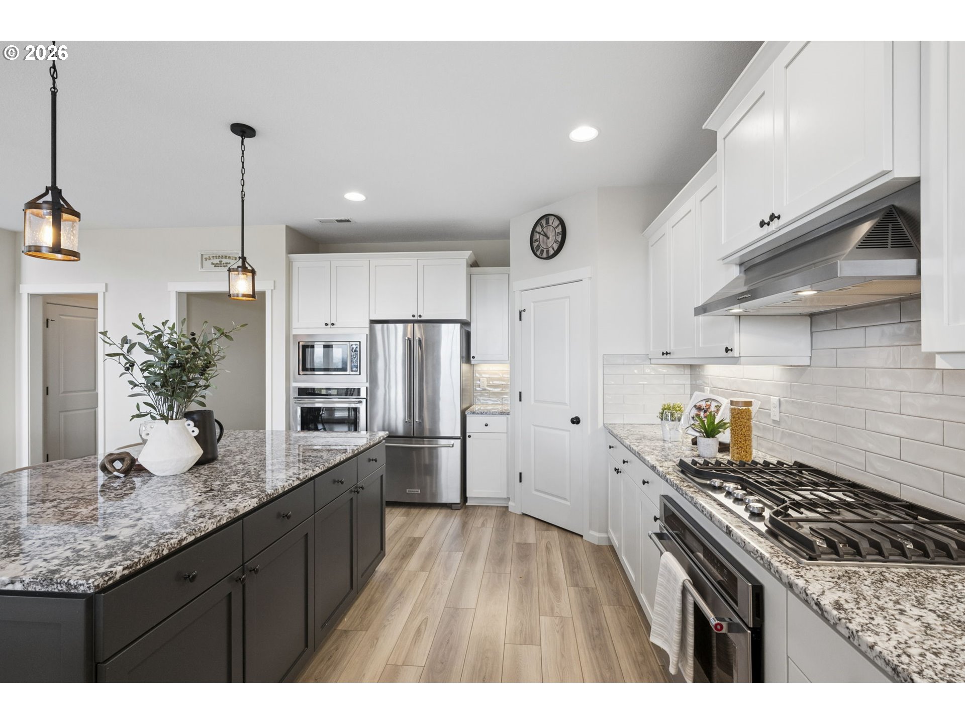 18255 Southeast Vista View Court Sandy, OR 97055 - Photo 14 of 48 a kitchen with stainless steel appliances granite countertop a sink stove and refrigerator